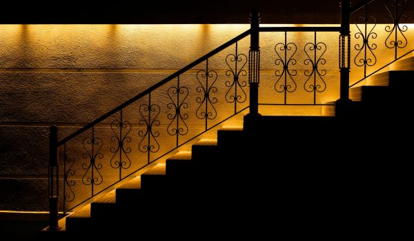 Modern,Steel,Arm,Staircase,On,Building,Entrance,At,Night